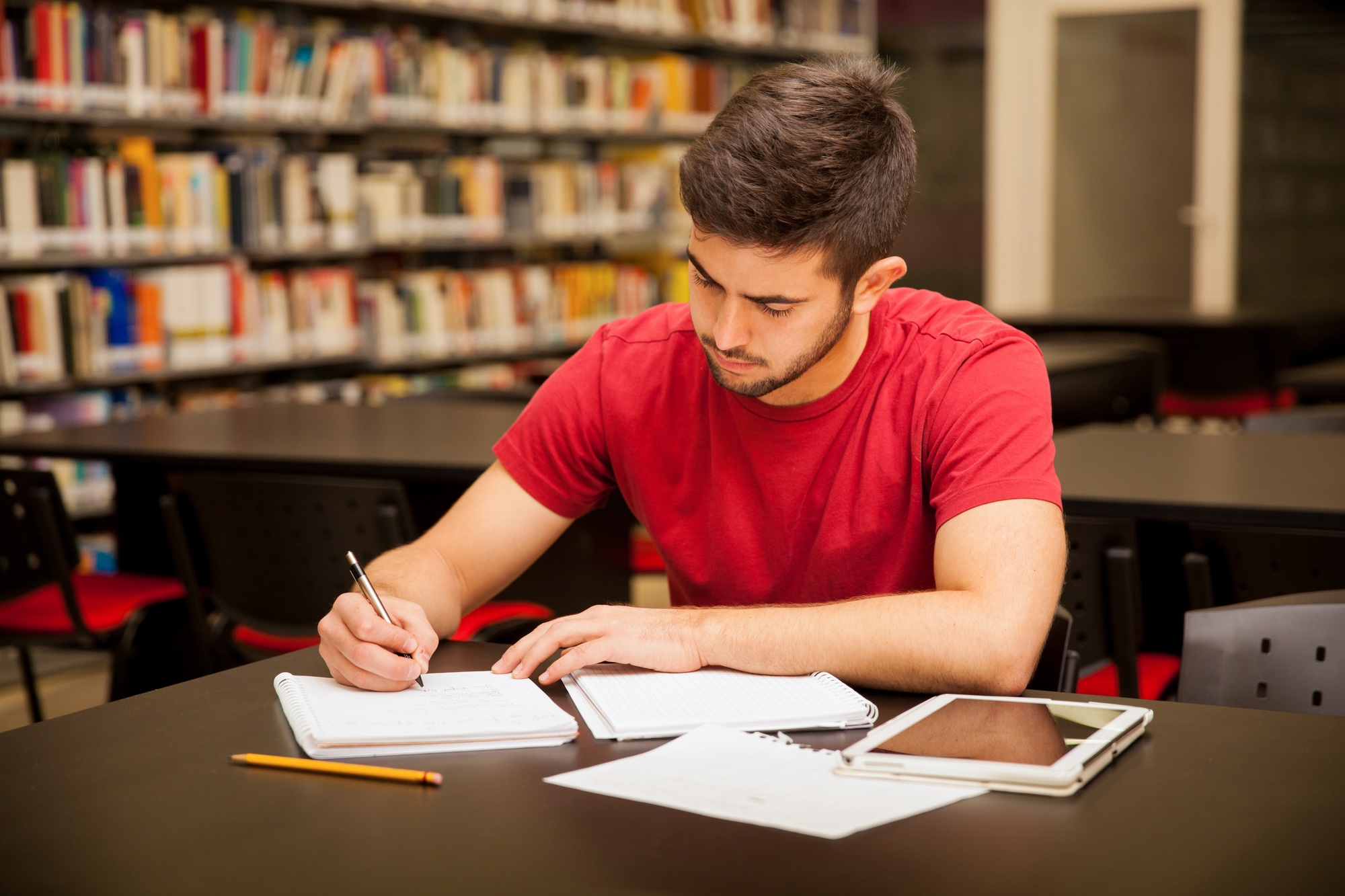 Man busy with school work